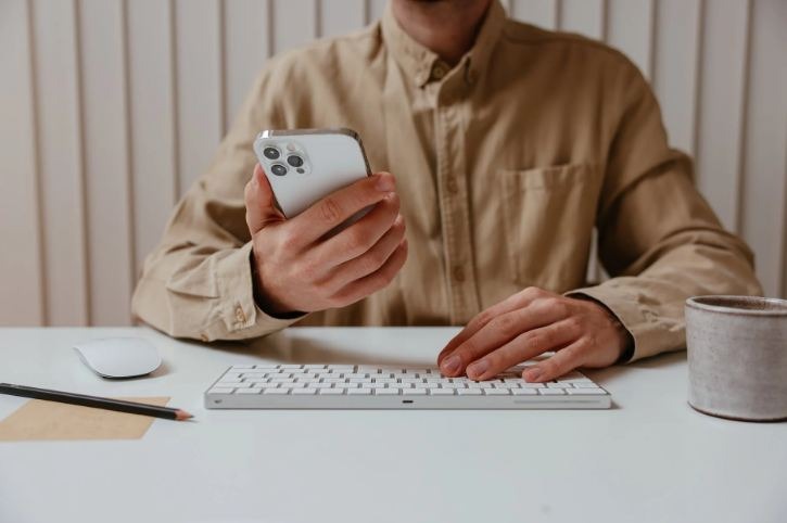 Man holding his mobile