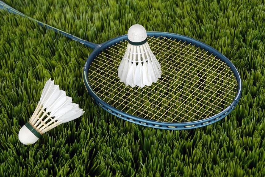 racket and shuttlecocks for badminton
