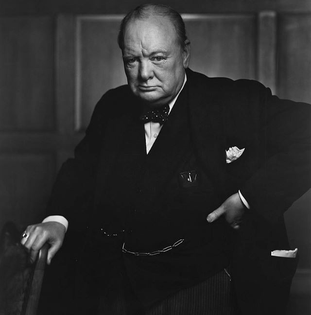 A black and white portrait of Winston Churchill
